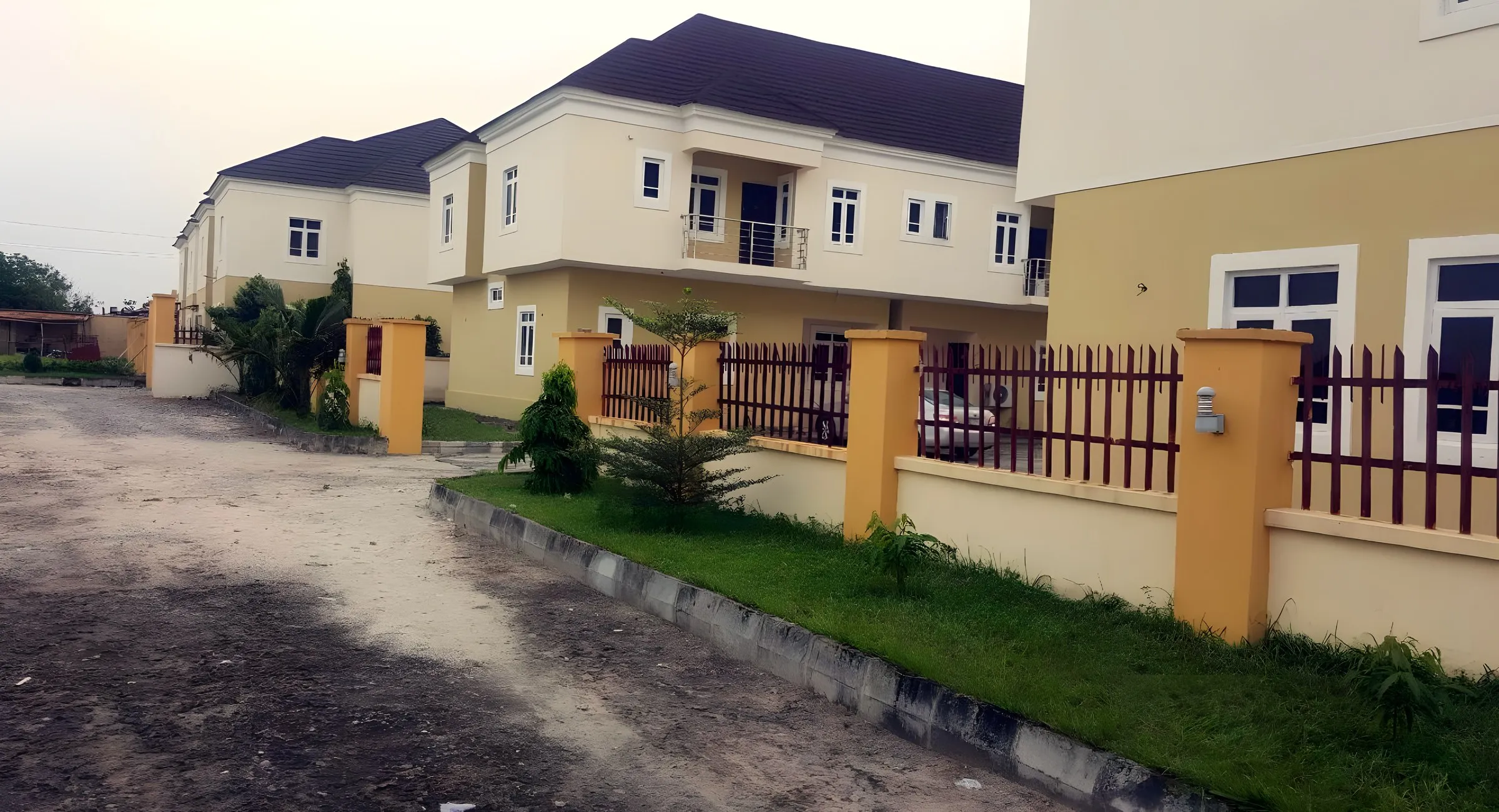 LivingspringCourts-1 · Gated terraces with landscaped frontage
